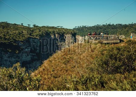 Cambara Do Sul, Brazil - July 16, 2019. People At Wooden Belvedere On The Edge Of Cliff At The Itaim