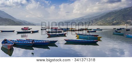 Pokhara, Nepal - November 11, 2019: Panorama Of Wooden Row Boats On Lake Phewa In Pokhara, Nepal