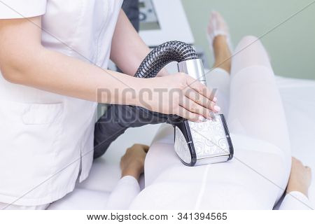 Lpg Girl Body Massage In Spa. The Girl Is Given A Hardware Massage, She Is Wearing A Special Jumpsui