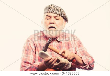 Mature Shoemaker In Workshop Make Shoes. Cobbler Workmanship. Shoemaker Working With Leather Textile