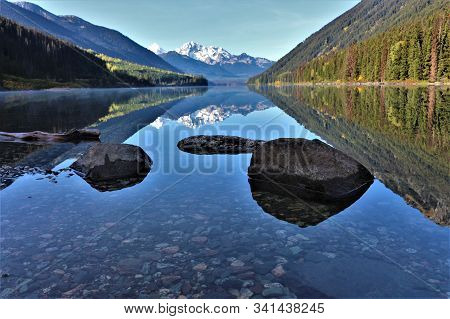 What A Beautiful View To A Reflection Lake In Western Canada, Near Whistler. Stone In The Front On F