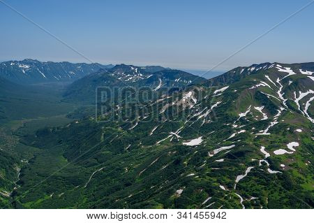 Panoramic View Of The City Petropavlovsk-kamchatsky And Volcanoes: Koryaksky Volcano, Avacha Volcano