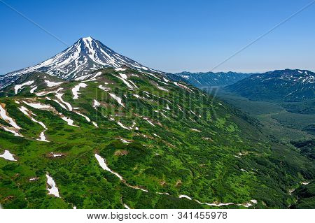 Panoramic View Of The City Petropavlovsk-kamchatsky And Volcanoes: Koryaksky Volcano, Avacha Volcano