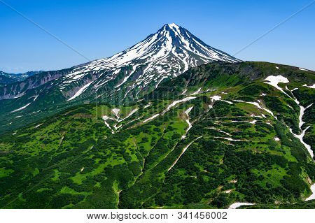 Panoramic View Of The City Petropavlovsk-kamchatsky And Volcanoes: Koryaksky Volcano, Avacha Volcano