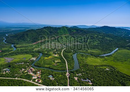 Panoramic View Of The City Petropavlovsk-kamchatsky And Volcanoes: Koryaksky Volcano, Avacha Volcano