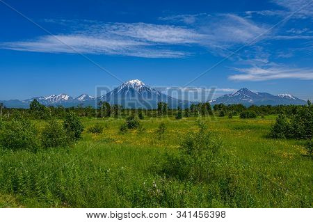 Panoramic View Of The City Petropavlovsk-kamchatsky And Volcanoes: Koryaksky Volcano, Avacha Volcano