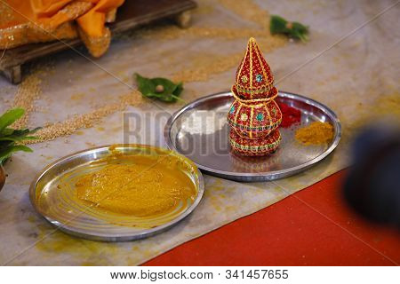 Traditional Indian Wedding Ceremony:  Coconut In Decorative Coper Kalash