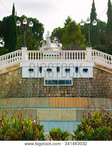 Fountain And El Batallador Statue In Parque Grande Or Jose Antonio Labordeta Park In Zaragoza, Spain