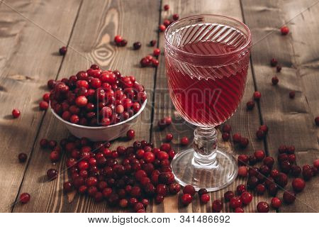 Red Vitamin Drink. Cranberry Juice And Fresh Cranberries On The Table