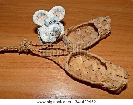 Bast Shoes And Little White Mouse. Lapti - Russian Old Wicker Traditional Peasant Shoes. According T