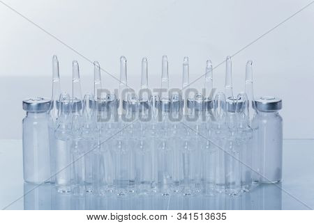 Glass Medical Ampoule Vial For Injection. Medicine Is Dry White Drug Penicillin Powder Or Liquid Wit