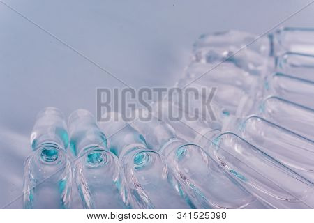 Glass Medical Ampoule Vial For Injection. Medicine Is Liquid Sodium Chloride With Of Aqueous Solutio