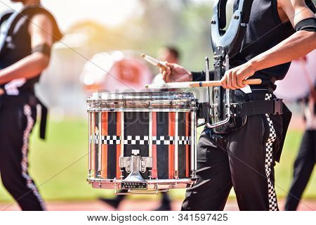 Close Up Of Marching Band Drummers Marching