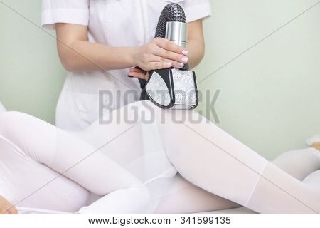 Lpg Girl Body Massage In Spa. The Girl Is Given A Hardware Massage, She Is Wearing A Special Jumpsui