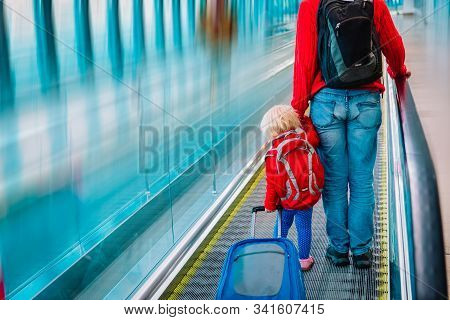 Father And Little Daughter On Travalator In Airport, Family Travel