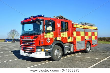 Grafham, Cambridgeshire, England - February 15, 2019: Scania Modern Fire Englne Parked On Tarmac