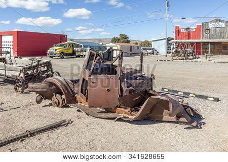 Seligman, Usa - March 7, 2019: Old Historic Wild West Facade With Livery And Tonsorial Of Doc Hollid