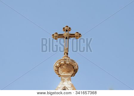 Jerusalem, Israel, December 28, 2018 : Large Metal Cross On Top Of The St. Nicholas Church Bell Towe