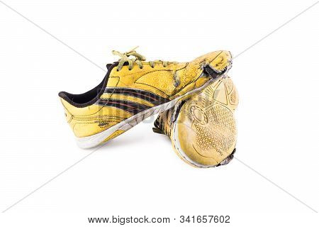 Old  Worn Out Futsal Sports Shoes On White Background Soccer Sportware Object Isolated