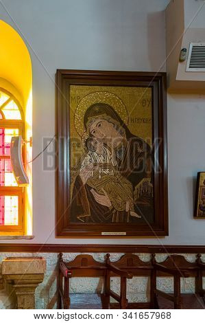 Jerusalem, Israel, December 28, 2018 : Icon Of The Mother Of God With Baby Hanging On The Wall In Th
