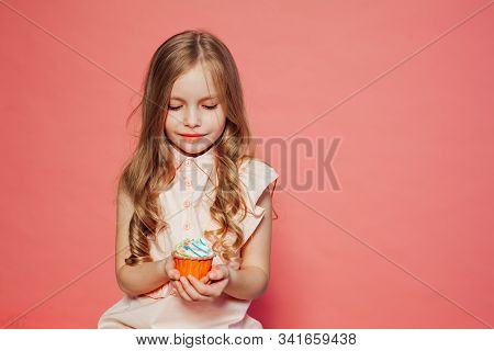 Beautiful Little Girl Blonde With Cake And Candy Portrait Of Food