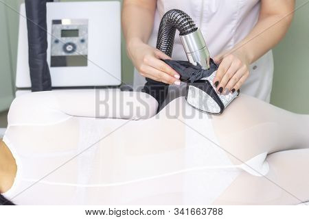 Lpg Girl Body Massage In Spa. The Girl Is Given A Hardware Massage, She Is Wearing A Special Jumpsui