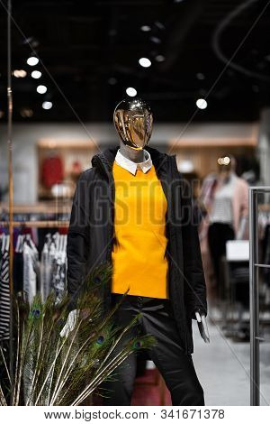 Female Mannequins In A Womens Store In Store Window Show Autumn Winter Collection . Standing Women D