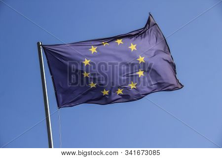 A European Flag In The Blue Sky