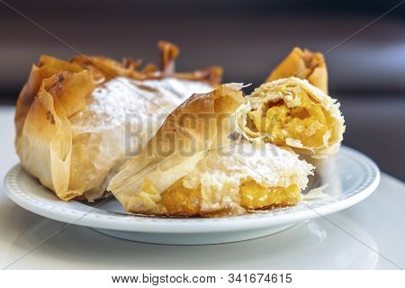 Delicious Portuguese Traditional Pastry From Coimbra On White Plate