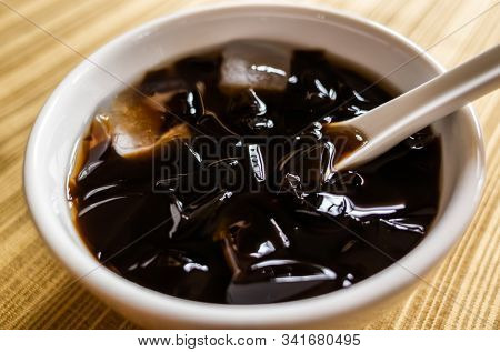traditional Taiwanese snacks of mesona black herbal tea in a bowl