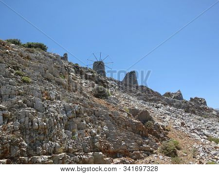 Vintage Windmills On Stone - Rocky Mountain