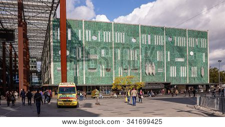 Piazza Square And A Store With Green Facade With Mosaic Pattern. Eindhoven, Netherlands.