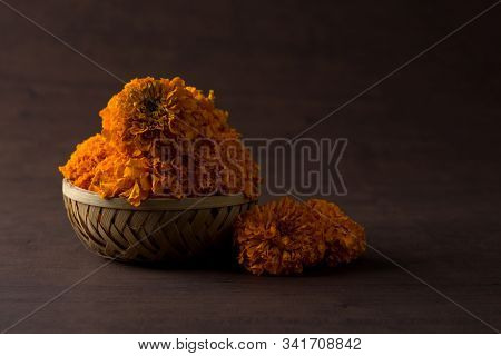 Marigold (zendu Flowers) Flowers In A Bamboo Basket.