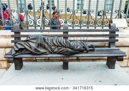 Madrid, Spain - October 19, 2019: Homeless Jesus - A Bronze Sculpture By Canadian Sculptor Timothy S