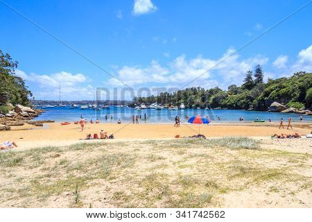 Sydney, Australia - December 28th 2013: People On Collins Flat Beach, Manly. The Bay Is A Popular Bo