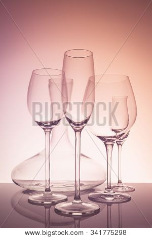 Glassware Selection With Wine, Champagne, Liquour Glasses And Decanter On Creative Background.. Fine
