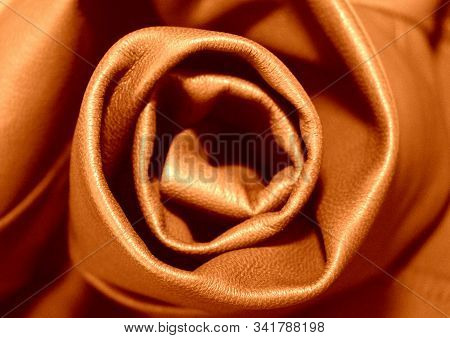The Texture Of Genuine Leather.
Rose Flower. Brown Leather. Brick Shade Of Material.