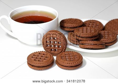Cookies With Chocolate. White Cup With Black Tea. Tea Ceremony. Sweet Morning. Still Life.