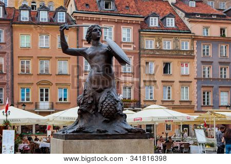 Warsaw, Poland - August 10, 2018: Statue Of Mermaid,  The Symbol Of The City Of Warsaw. This Statue 