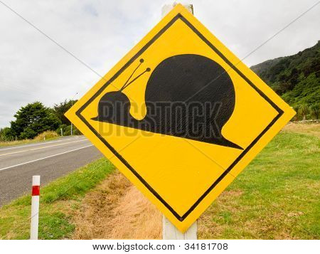 Fake attention Kauri Snail Crossing Road Sign