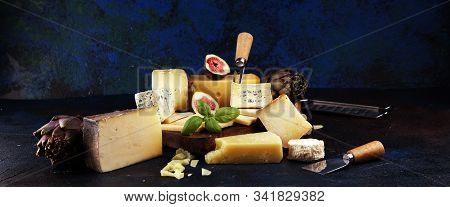 Different Sorts Of Cheese. Cheese Platter With Different Cheese And Spice