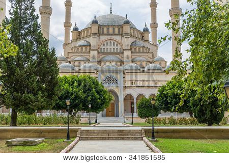 Turkeys Largest Sabanci Central Mosque In Adana Among Bright Foliage Of Trees