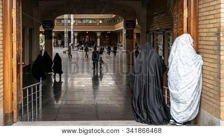 Shrine Of Fatima Masumeh, Qom, Iran - May 2019: Iranian Women At The Gates Of Shrine Of Fatima Masum