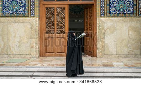 Shrine Of Fatima Masumeh, Qom, Iran - May 2019: Iranian Religious Woman Praying Inside Shrine Of Fat