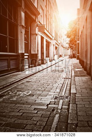 Empty London side street with neo noir black and white poster effect