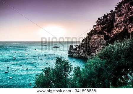 Positano, Amalfi Coast Fairy Tale Seascape View To Rock Cliff With Tower, Aqua Menthe Color Sea And 