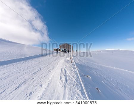 Slopes Of Parnassos Mountain With People In A Sunny Day