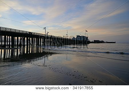 Santa Barbara, California - May 18, 2019: Stearns Wharf At Sunrise Under Colorful High Altitude Clou