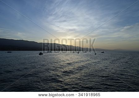 Santa Barbara, California - May 18, 2019 Sailboats Anchored Off Stearns Wharf In Predawn Light.