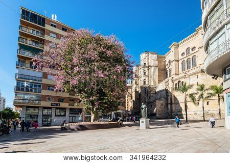 Malaga, Spain - December 4, 2018: Cardenal Herrera Oria Statue On The Cortina Del Muelle Street (cal